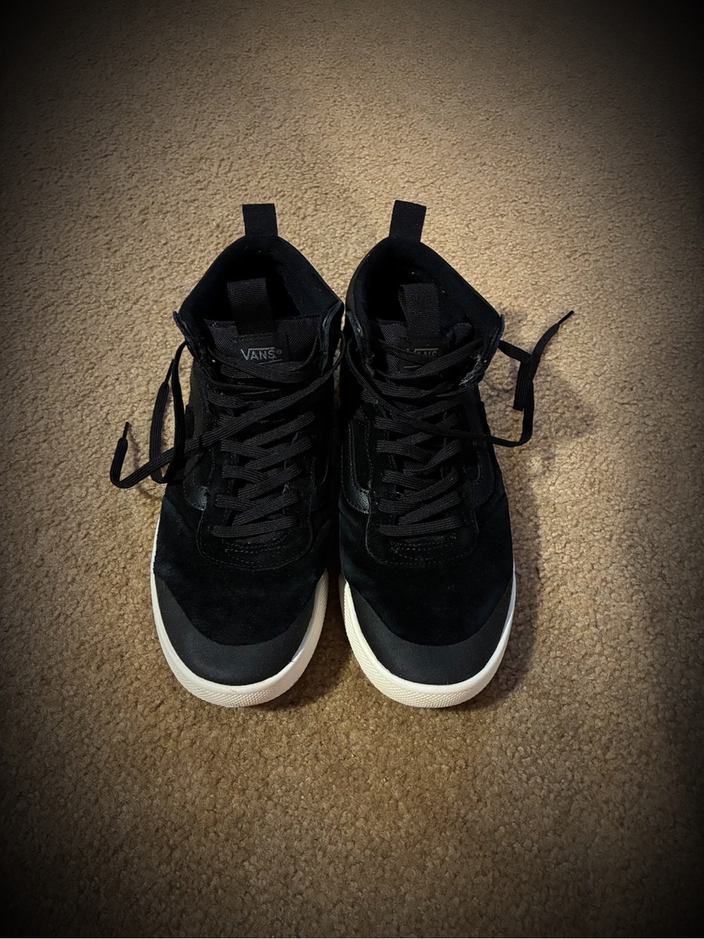 Vans Men’s Black High-Top Sneakers with White Sole